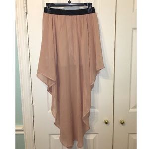 Skirt, short in sides, long in front and behind